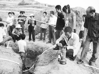 图片新闻:<em>礼县</em>马河乡党委政府把群众生活饮用